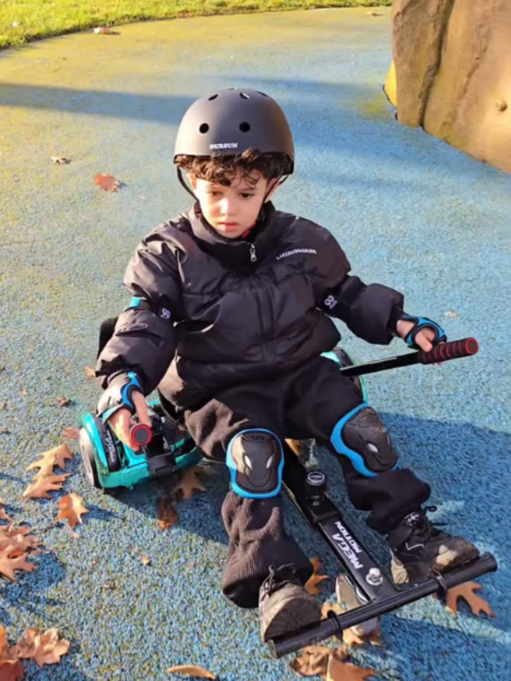Images of a little boy riding an A03 hoverboard and go-kart