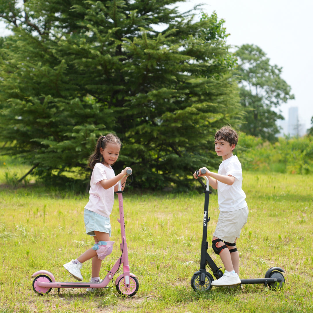 Image of a boy and a girl riding a pink and black MEGA MOTION ME1 electric scooter