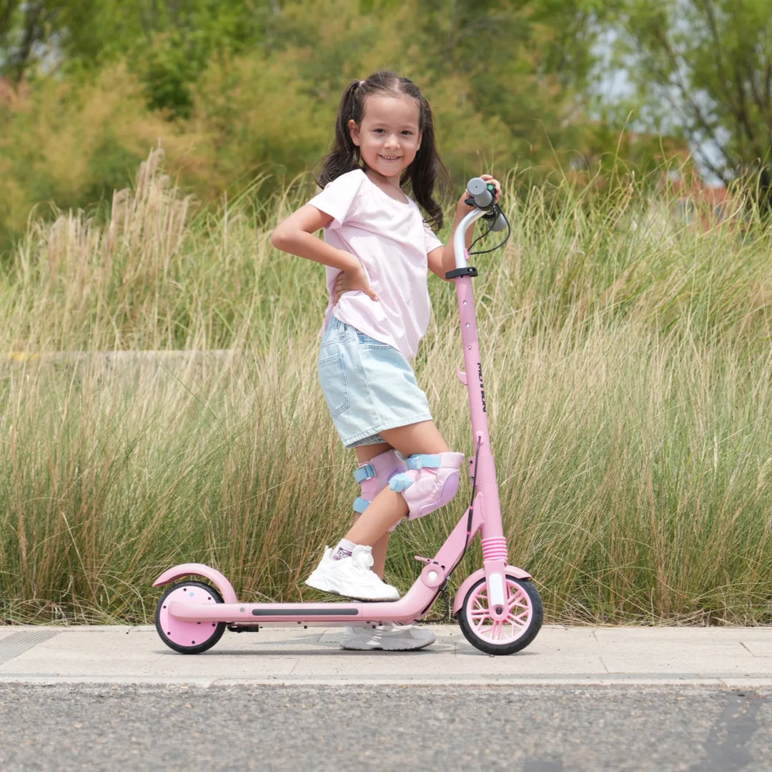 Image of a girl riding a pink MEGA MOTION ME1 electric scooter